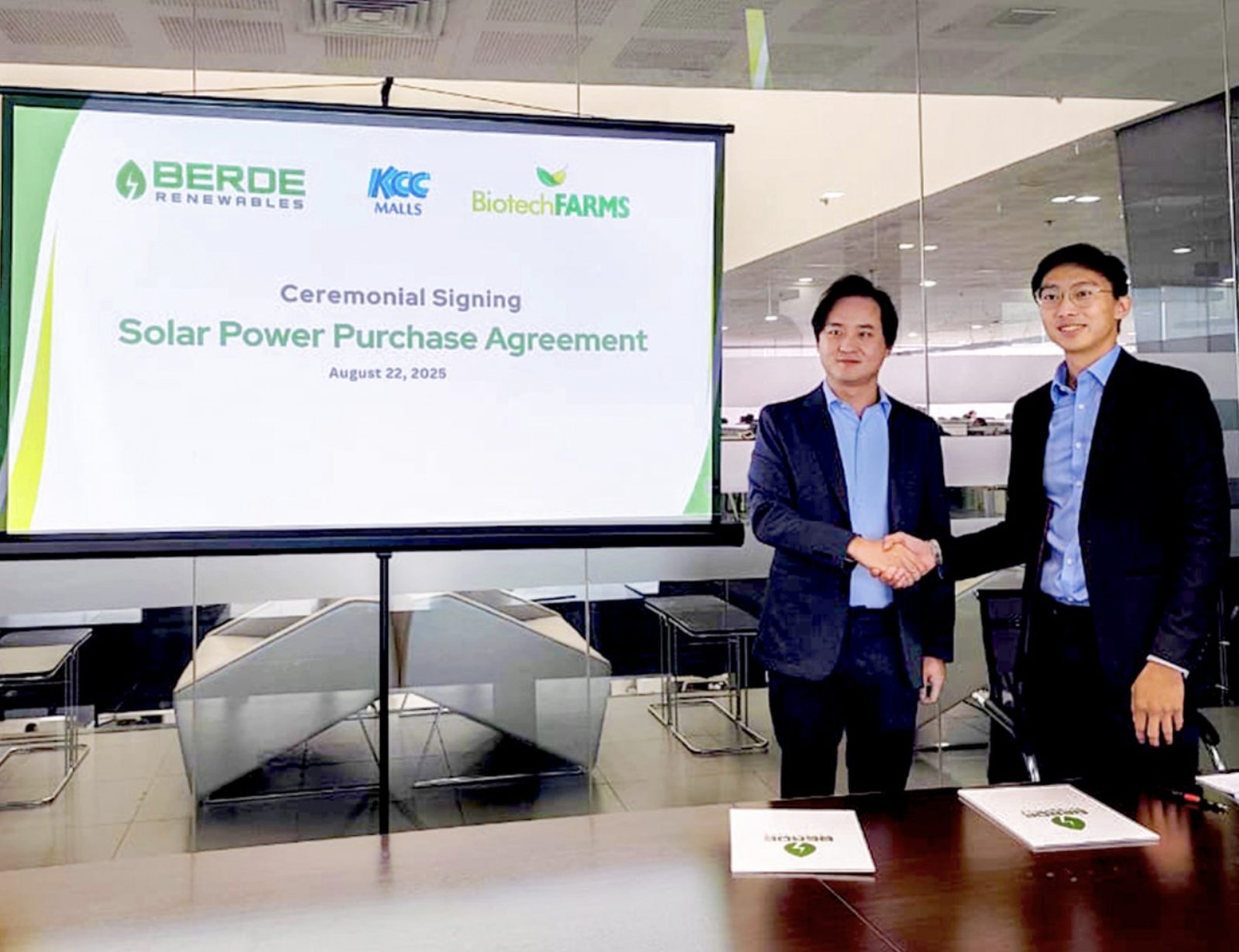 Ceremonial signing of a solar power purchase agreement involving Berde Renewables, KCC Malls and Biotech Farms